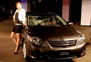 Beautiful Girl with Corolla Altis