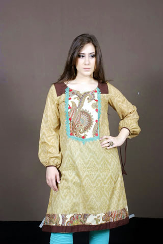 Desi Pakistani Girl in Maria B. Oranve Dress