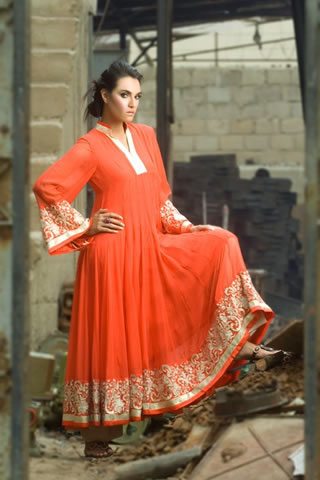 Beautiful Model Nadia Hussain wearing Orange frocks