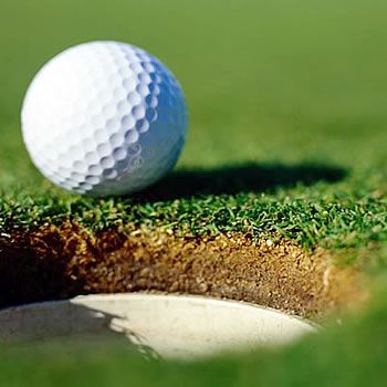 golf ball by hole