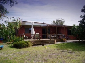 Beautiful Beach House with Red Brick Wall