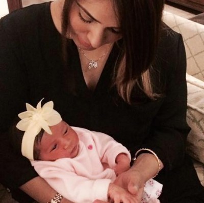 Mehreen Raheel with her one year old daughter and two year old son. Mehreen Raheel with her one year old daughter and two year old son.