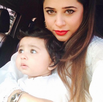 Mehreen Raheel with her one year old daughter and two year old son. Mehreen Raheel with her one year old daughter and two year old son.